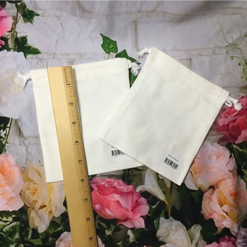 TWO (2) Guerlain mini small white drawstring dustbag new approx 5” x 5”